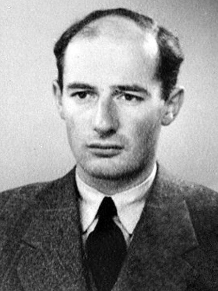 A black and white passport photo of Raoul Wallenberg