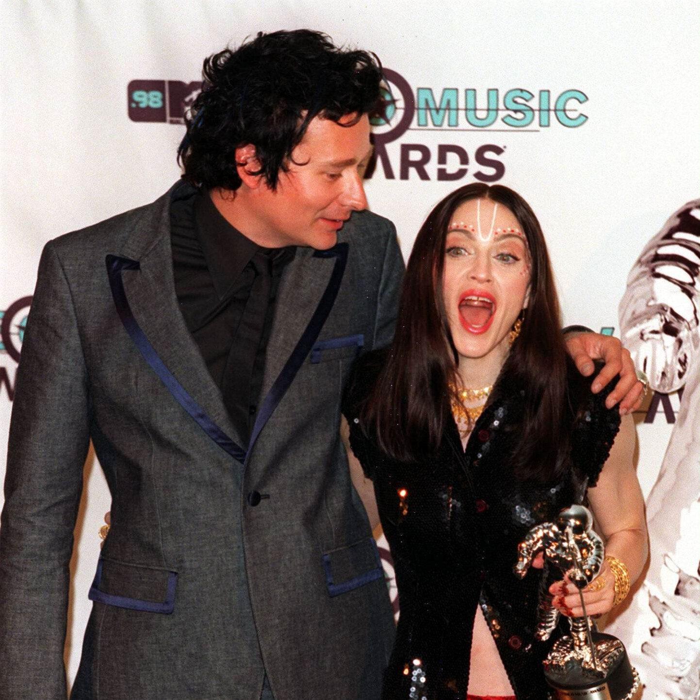 Director Jonas Åkerlund and pop artist Madonna at some gala.