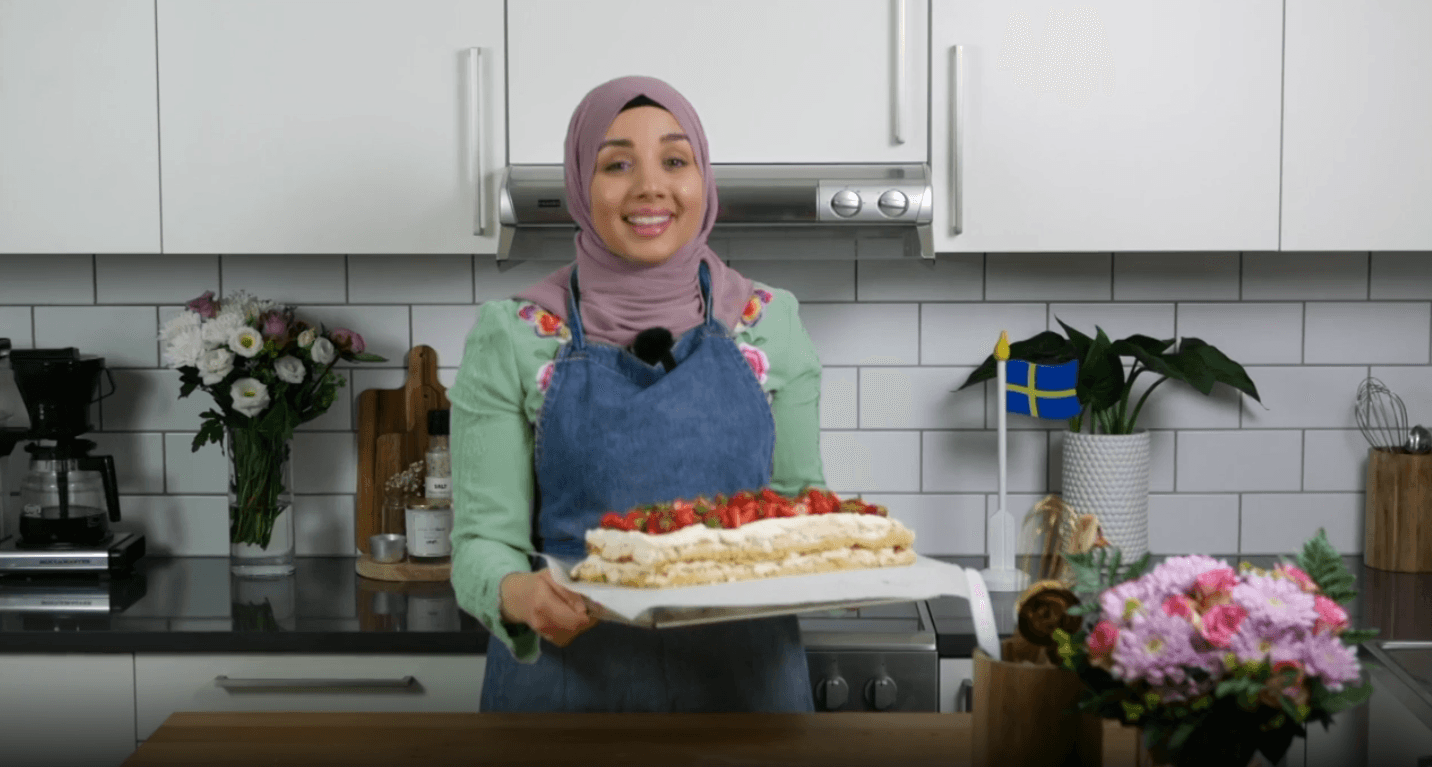 Camilla Hamid baking strawberry cake.