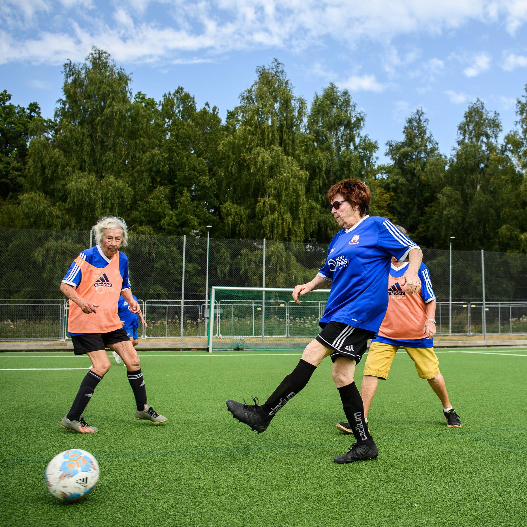 Elderly women playing football.