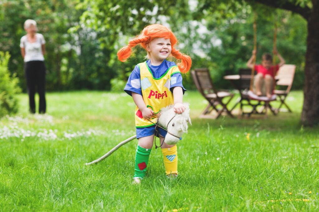 A child dressed as Pippi Longstocking.