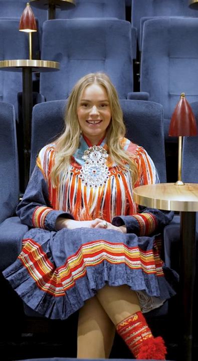 Actor Elin Oskal in traditional Sami clothing.