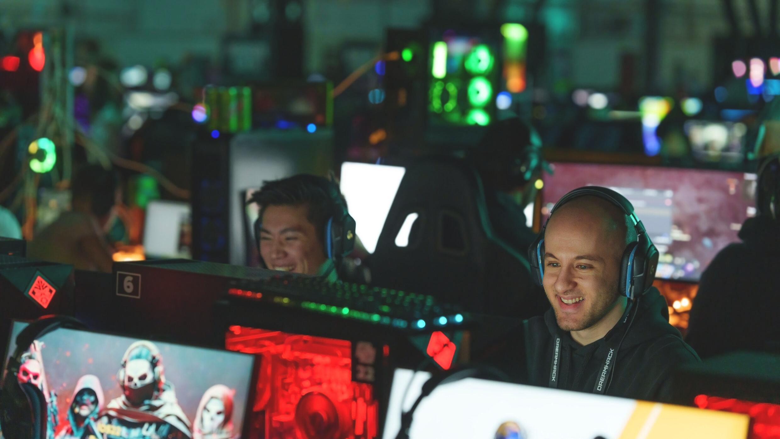 People sit in front of computer screens.