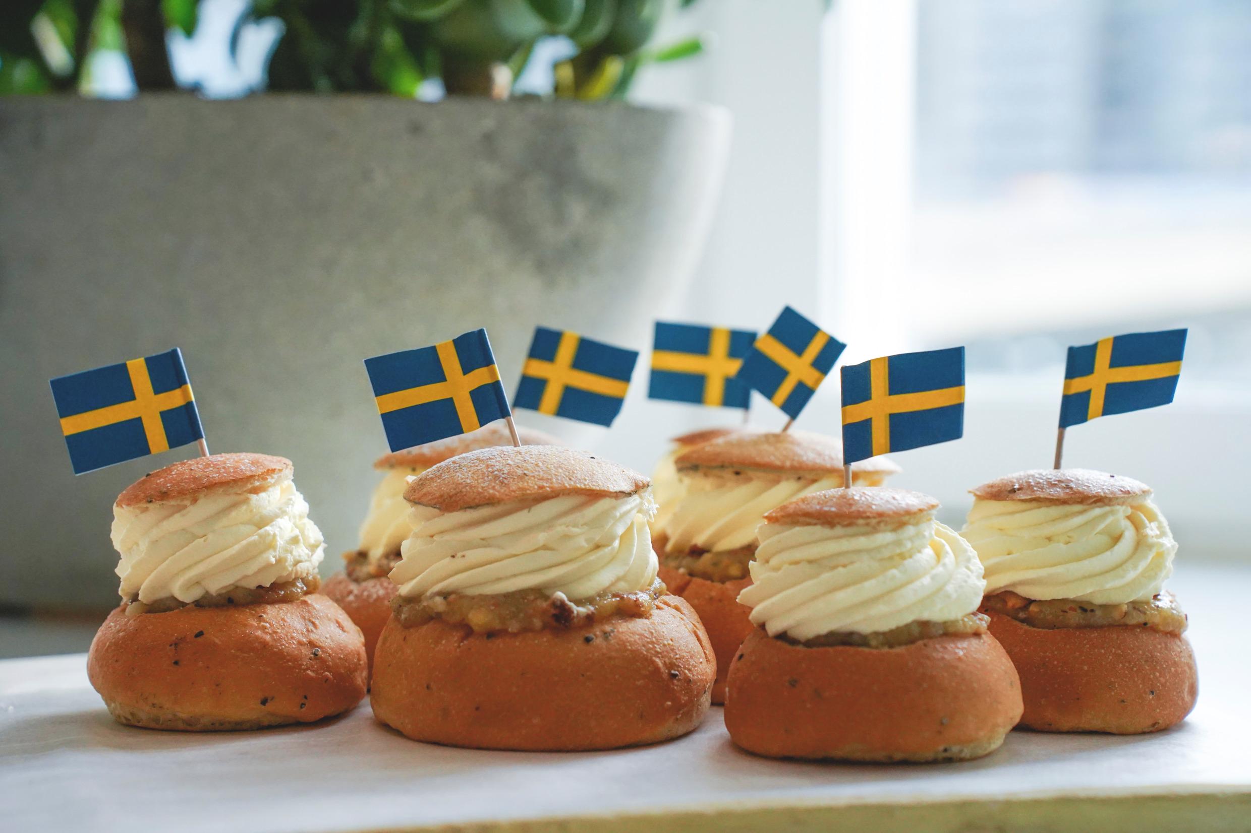Semlor decorated with the Swedish flag.