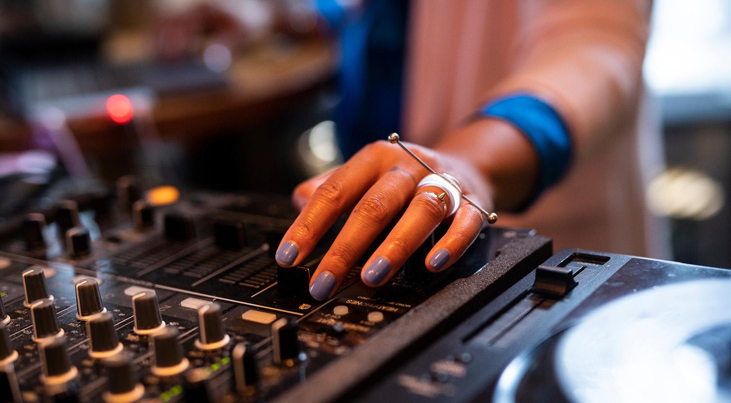 A DJ playing music.