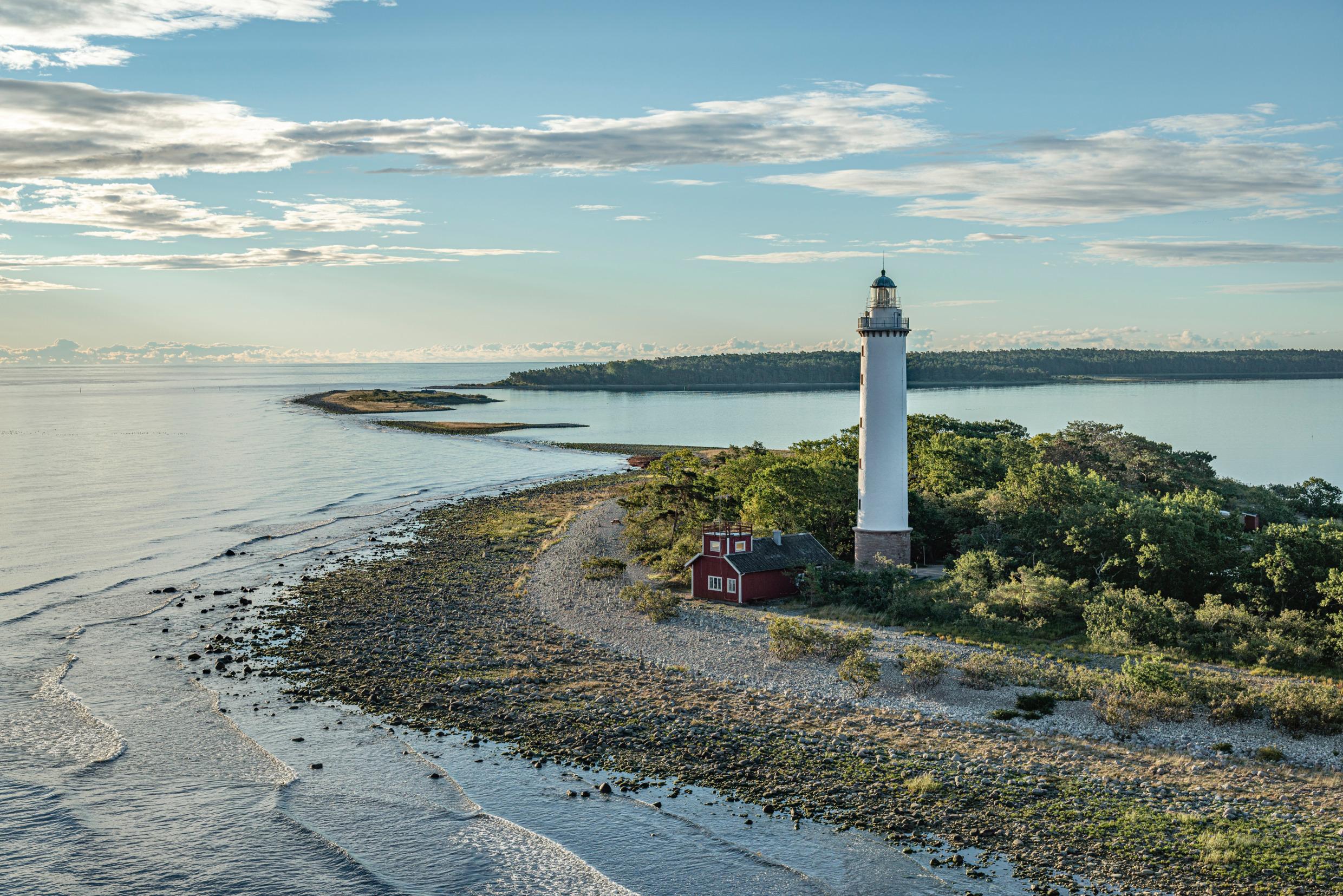 A lighthouse on an islet in the Baltic Sea.
