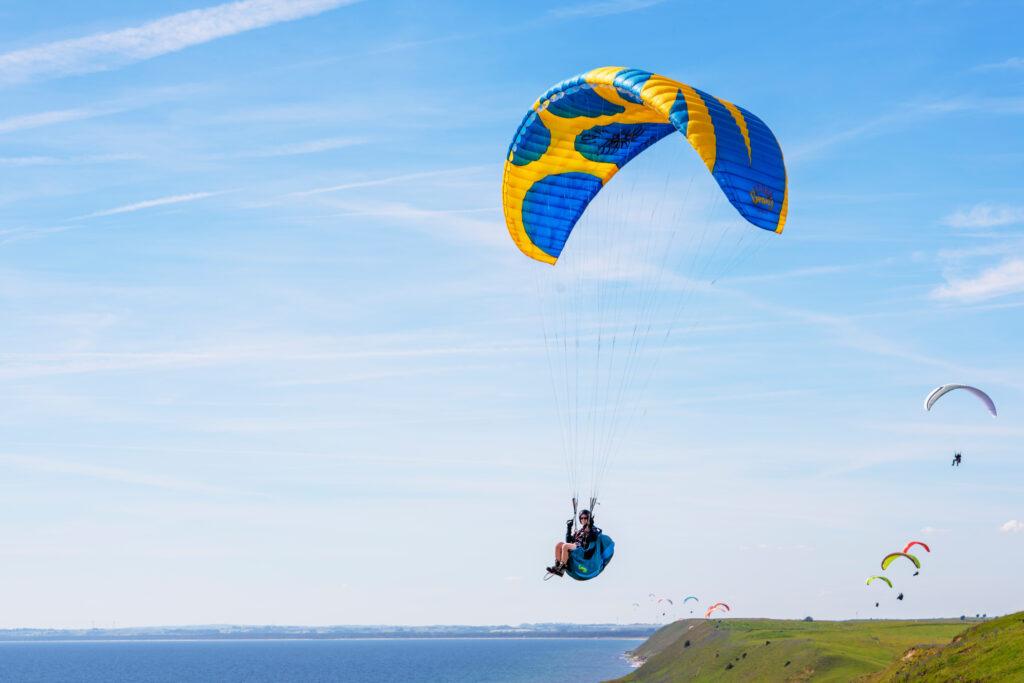 Paraglider with the colours of the Swedish flag.