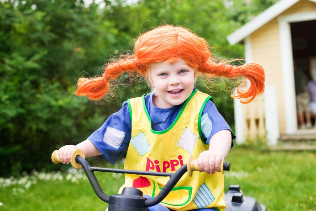 A child dressed as Pippi Longstocking.