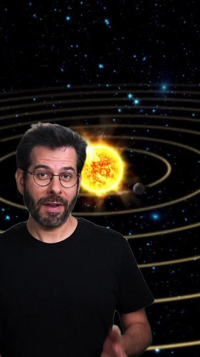 Gabriel the guide in front of the solar system.
