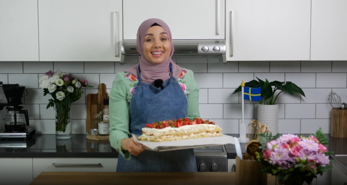 Camilla Hamid baking strawberry cake.