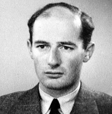 A black and white passport photo of Raoul Wallenberg