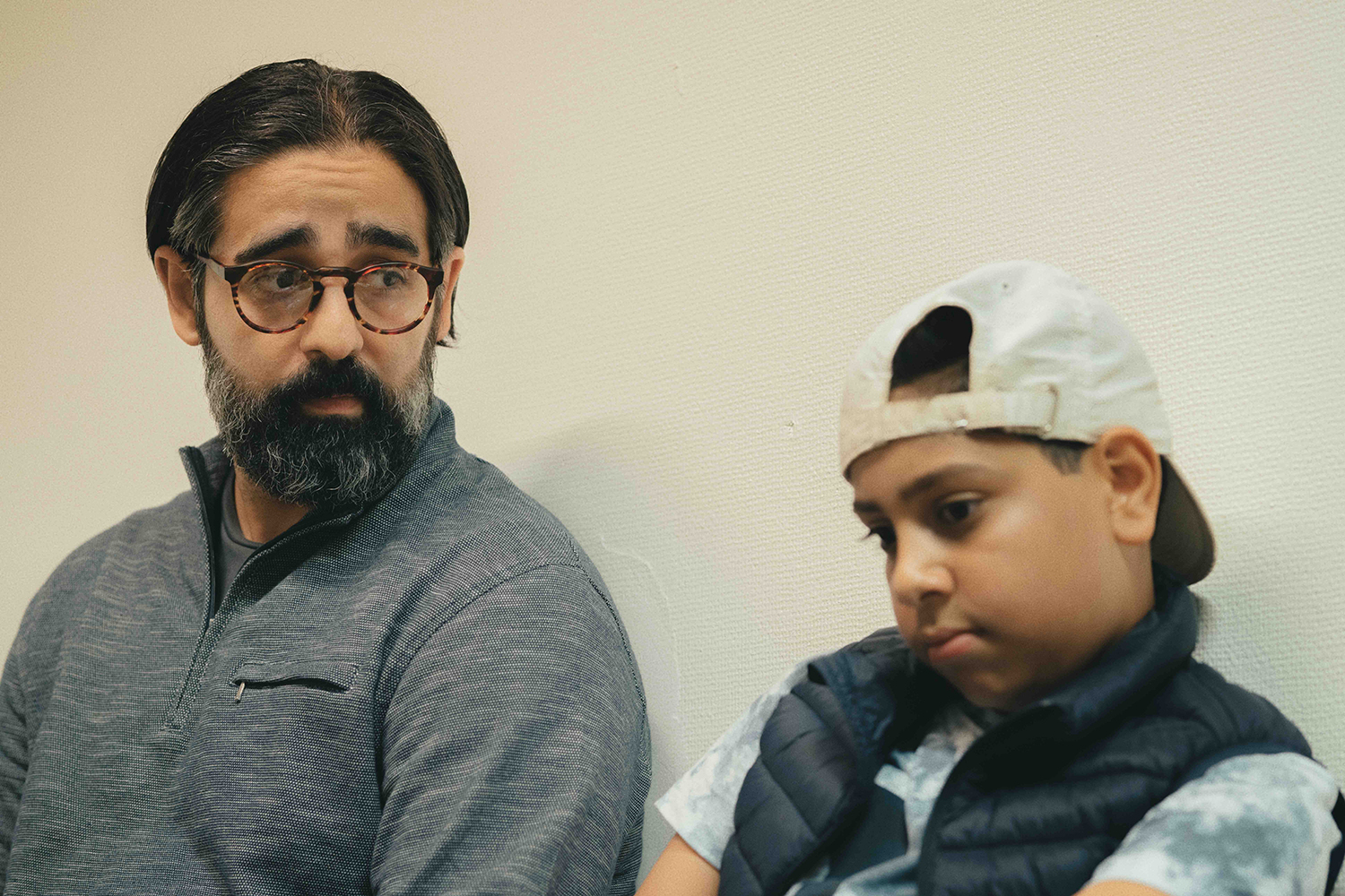 Abdel's teacher giving him a sad,, worried look.