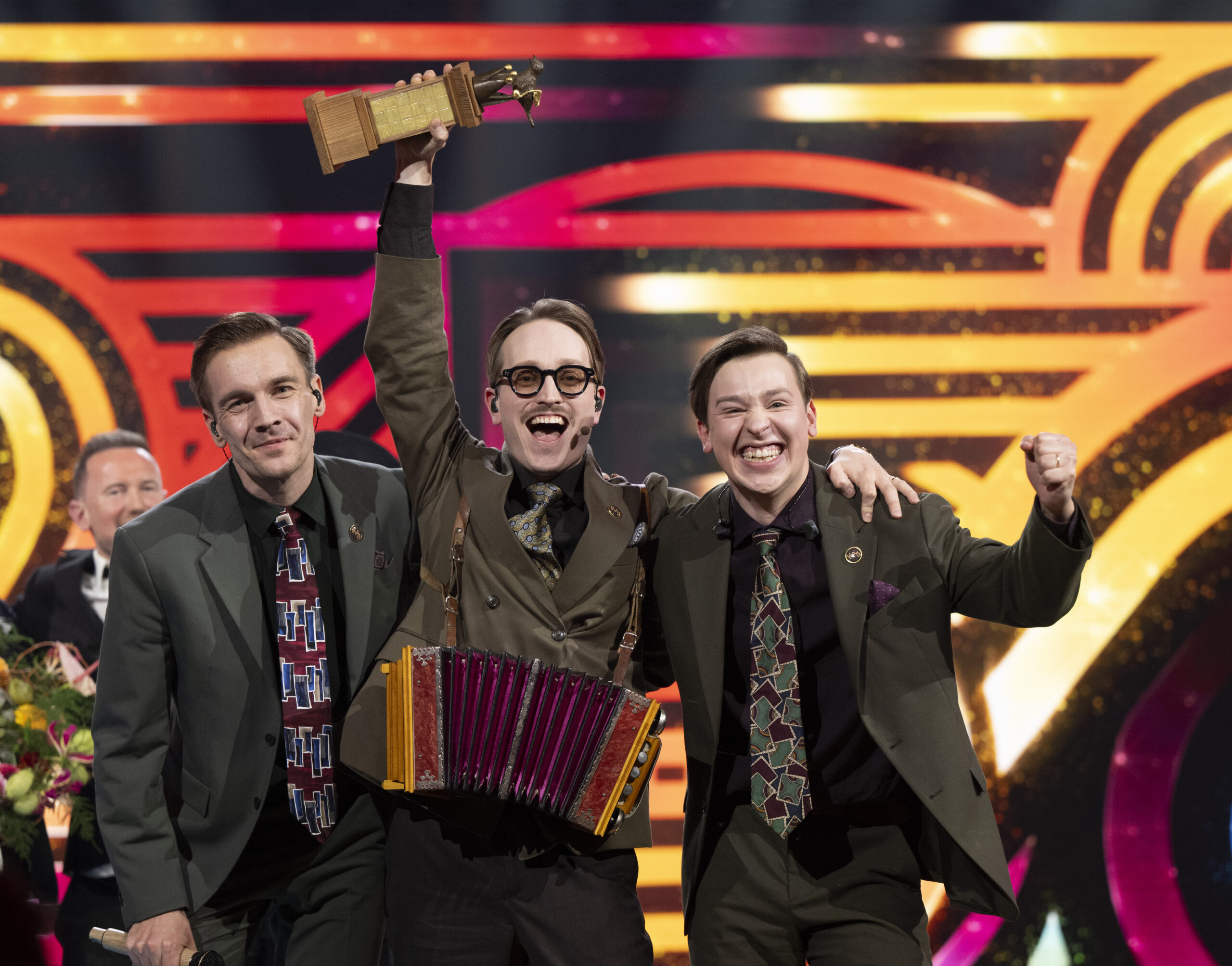 The three members of KAJ winning Melodifestivalen.