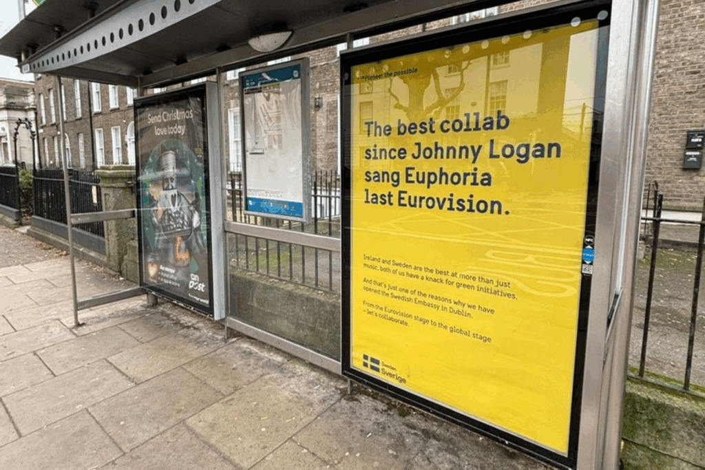 An ad at a bus station saying &quot;The best collab since Johnny Logan sang Euphoria last Eurovision&quot;