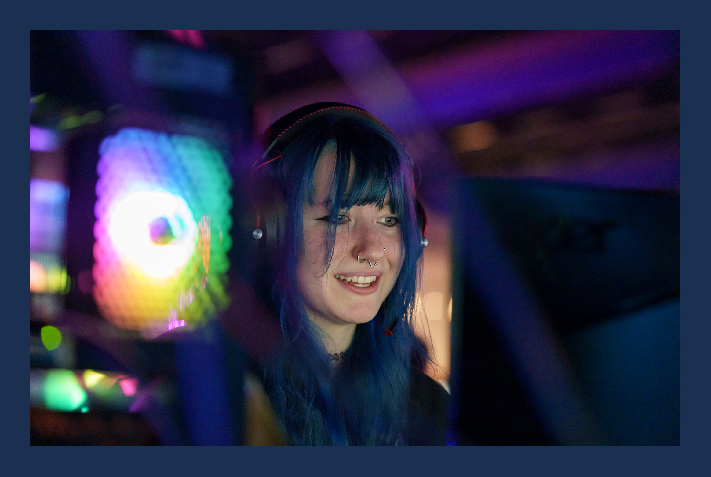 A girl gaming at an event.